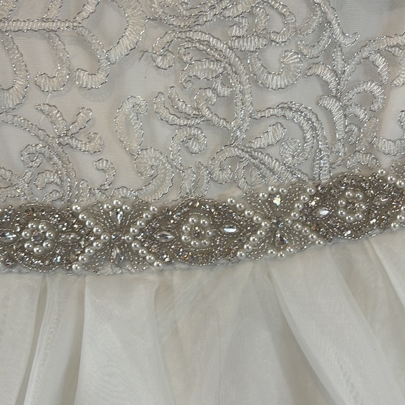 These dresses are light cream color not white but not ivory. Both for $32 - Picture 2 of 5